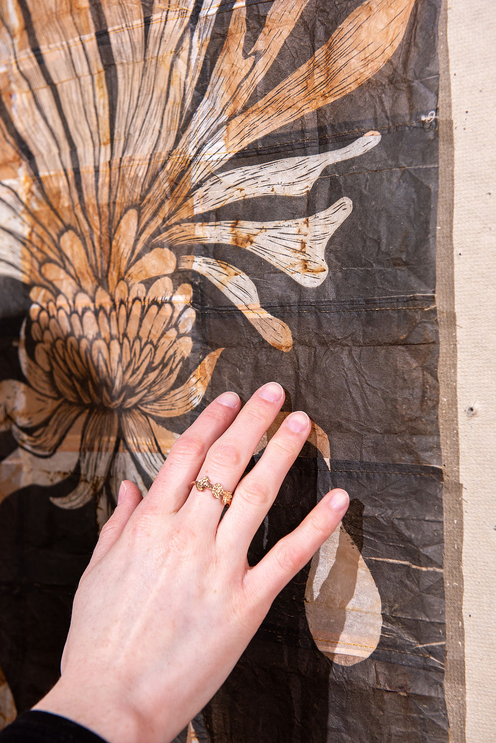 Pictured: block print on hand-sewn tea bag paper.