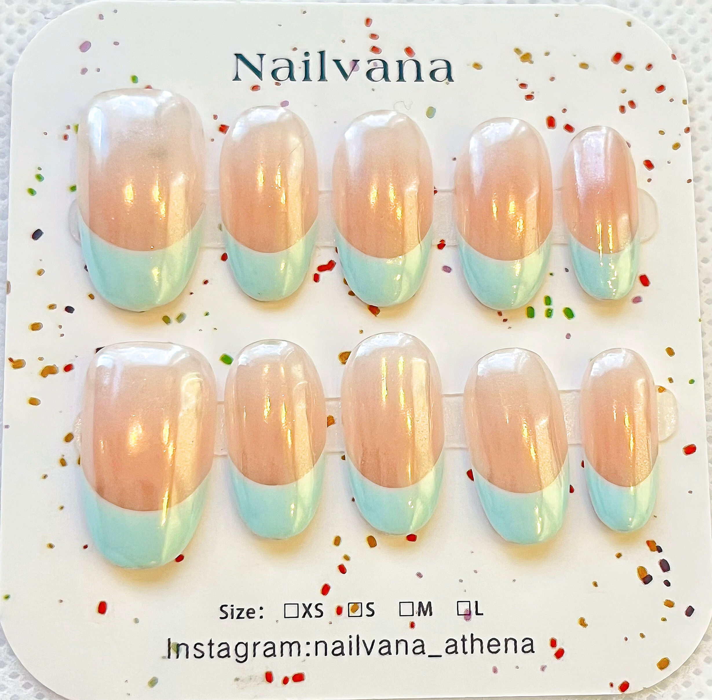 Pastel French Nails with Nailvana design, text visible, Nailvana Athena, stylish nails
