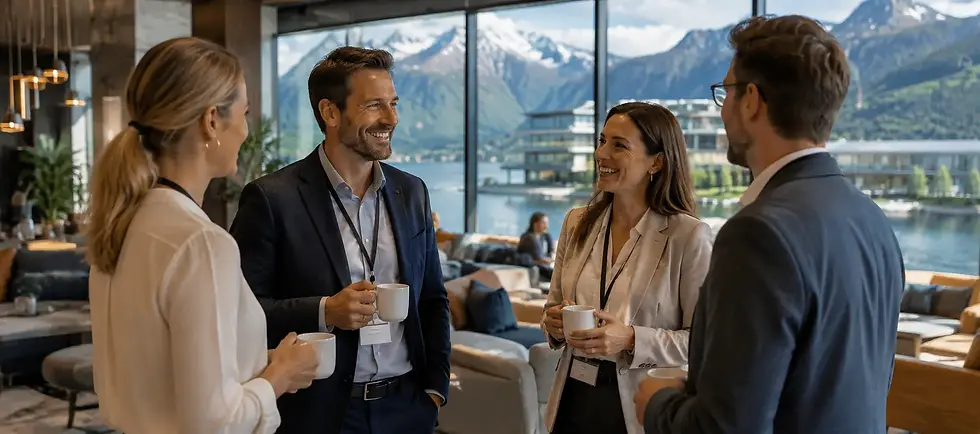Bedriftsgjester på konferanse i moderne hotell med utsikt over norsk natur