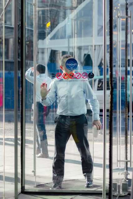 Man in revolving door