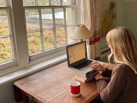 A worker at home on their laptop