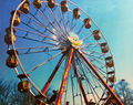 ferris wheel created withe a lot of different elements on a canvas done by George Maxwell