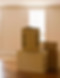 moving boxes on a hard wood floor inside a clean home