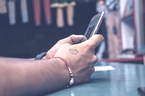 Man%20Browsing%20Phone_edited.jpg
