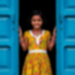 joyful-girl-yellow-dress-standing-doorway.jpg