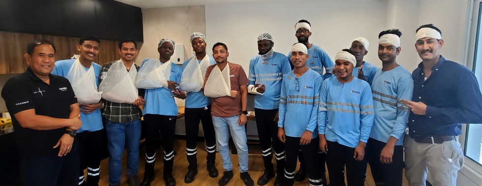 employee empowerment initiative showing a group of factory employees receiving first aid training at sineo packaging