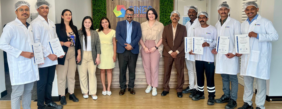 key sineo packaging employees receving HARA certification from TUV SUD Middle East 