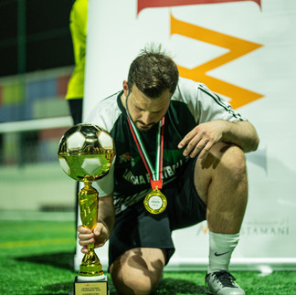 Sineo Packaging's Abdallah from 'sineo synergy' team celebrating victory at AW Rostamani's 2024 Layaka Football Tournament - Corporate sports match