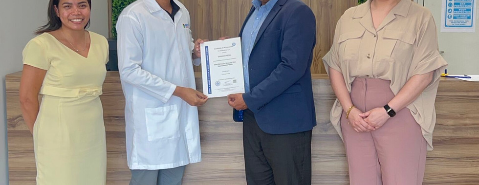 key sineo packaging employees receving HARA certification from TUV SUD Middle East 