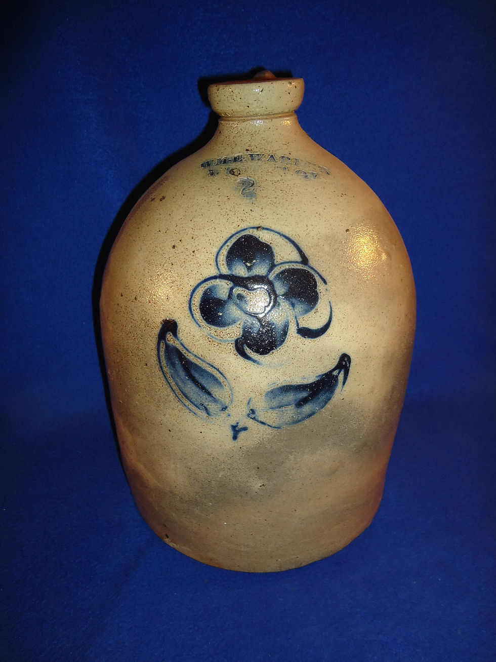 WM. E. Warner, West Troy Stoneware 2 Gallon Jug with Flower #1147