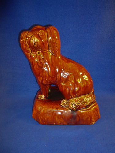 Yellow Ware Rockingham Dogs Yellow Ware Seated Spaniel Dog Figural Doorstop with Rockingham Glaze ...