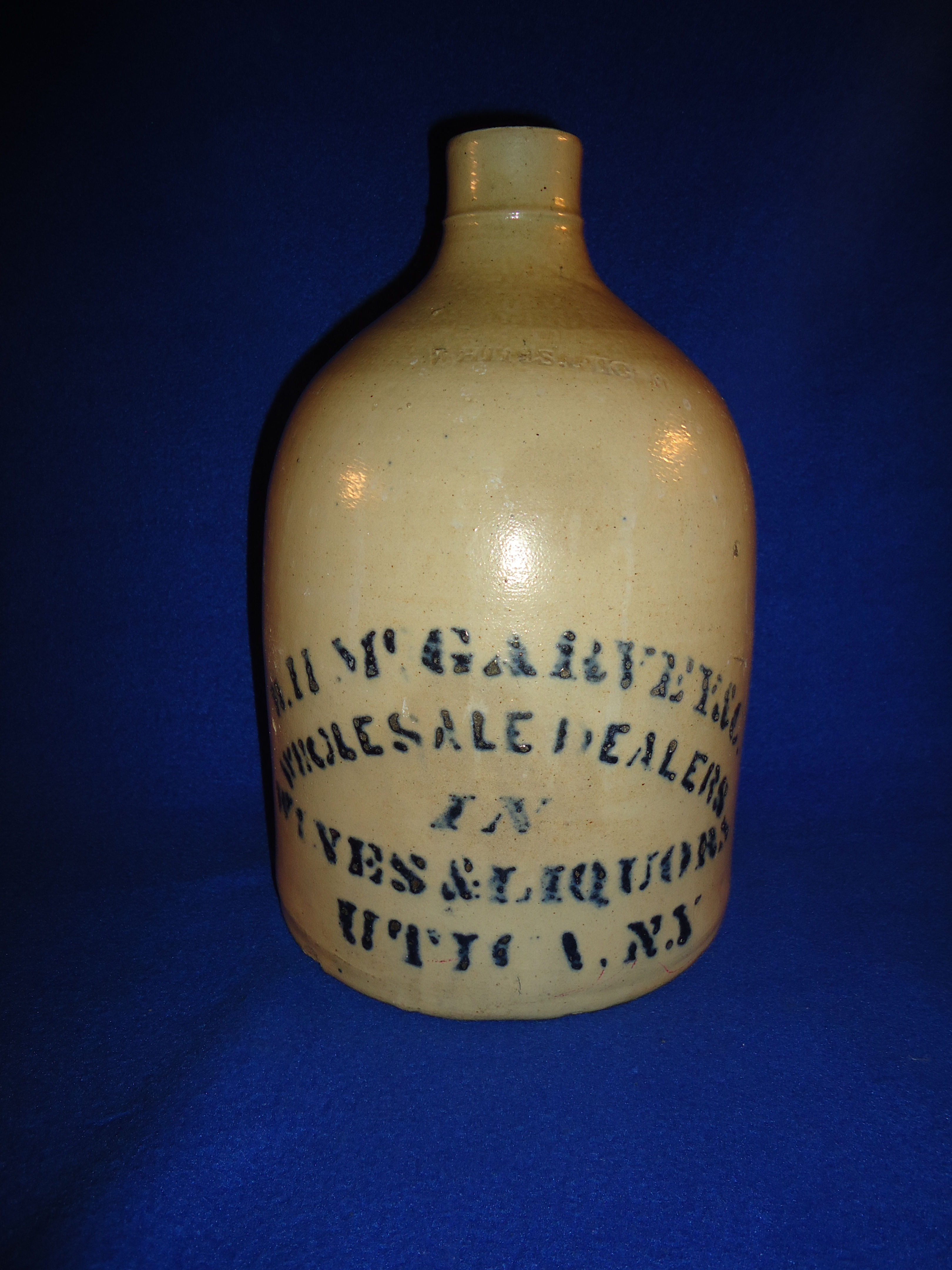 McGarvey, Utica, New York Stoneware Wine & Liquor Jug by Whites Utica #7311