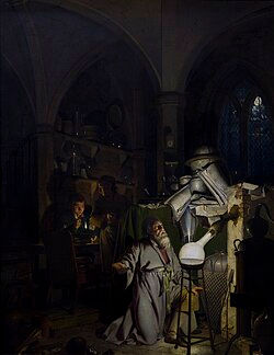 An alchemist kneels, gazing at a glowing flask in a dim lab with scattered items. A man observes from a desk. Gothic arches cast shadows.
