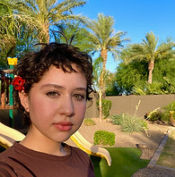 A photo of Elliana Escamilla leads to a video of her original song, "Flight".