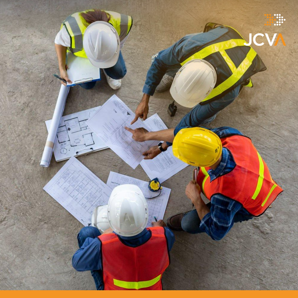3 people in white hard hats, one person with yellow hard hat
