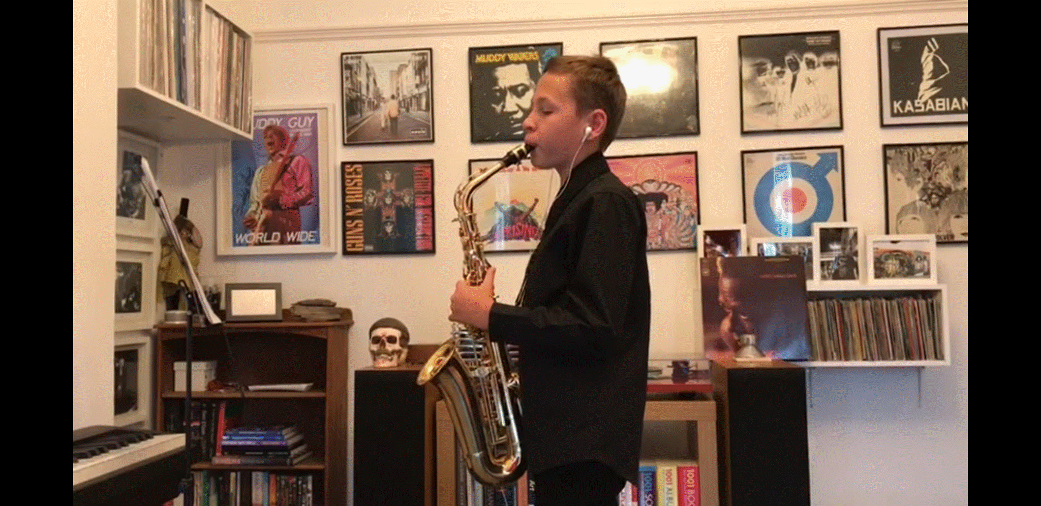 Louis in his music room.gif