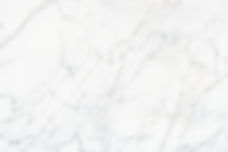 close-up-white-marble-textured-wall.jpg