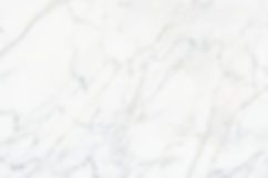 close-up-white-marble-textured-wall.jpg