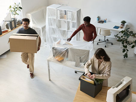 Professional Movers Relocating Office Furniture