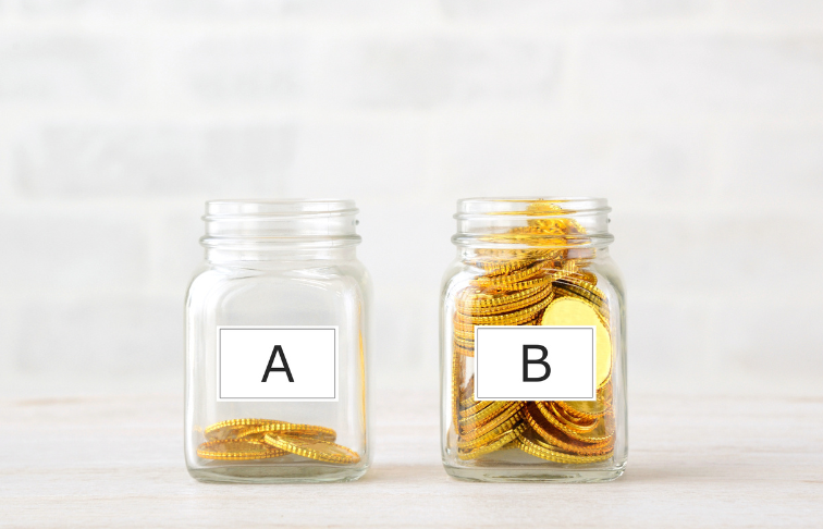 Two jars labeled A and B with different amounts of gold coins