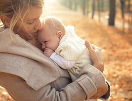 Mother holding baby_edited.jpg