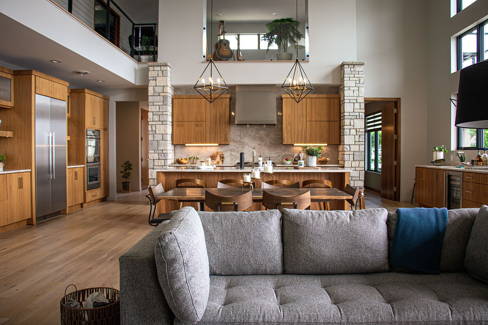 Eye-level view of a cozy living room with natural wood accents and soft lighting
