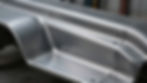 Fabricated and reinforced metal panel with clean seams and precision fasteners.