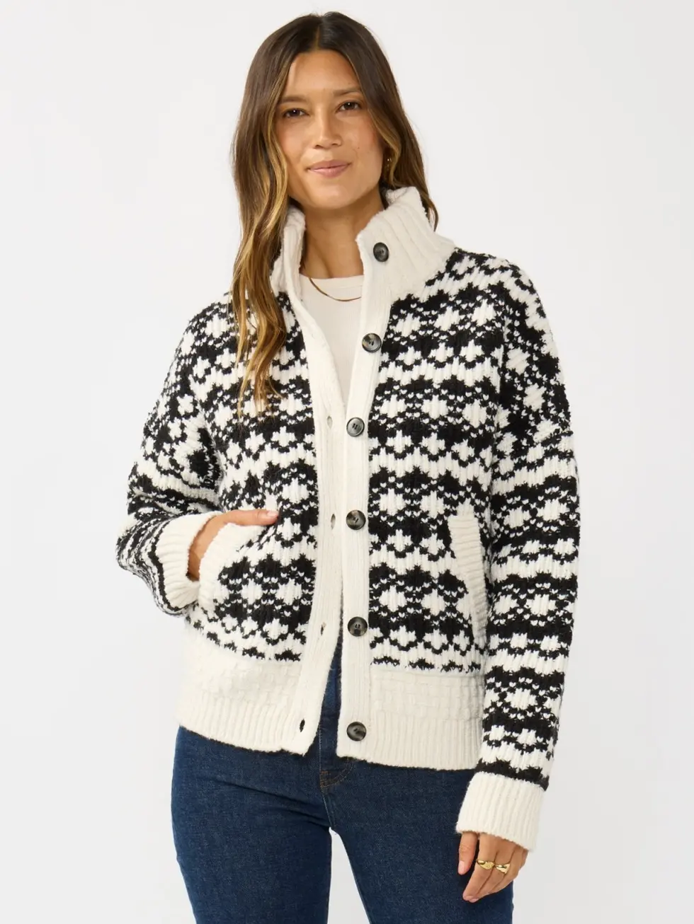 Close-up of the button-down detail and front patch pockets on the Bethany knit jacket.