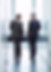 Business Meeting of Two Men Walking in the Hall