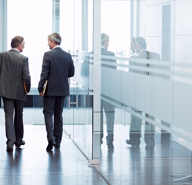 business meeting with two men negotiating beverage contracts