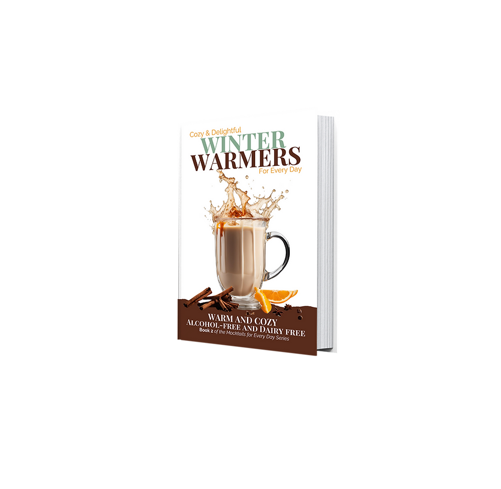 A book: Cozy & Delightful Winter Warmers for Every Day - it has a glass mug of beige liquid splashing out the top, with orange wedges and cinnamon sticks beneath.