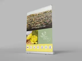 a roll up banner for pri pear with a cactus on it