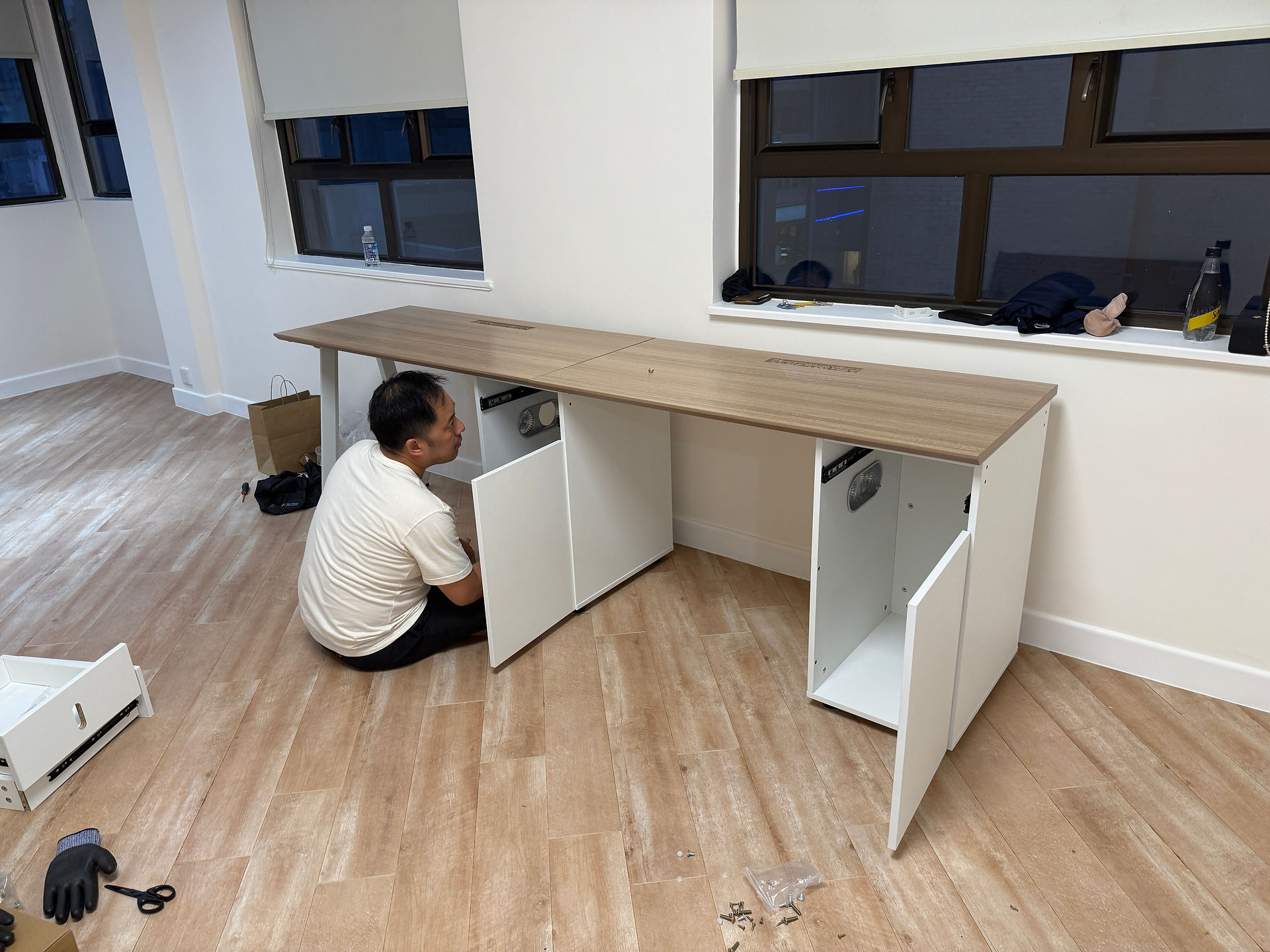 Man building office desk