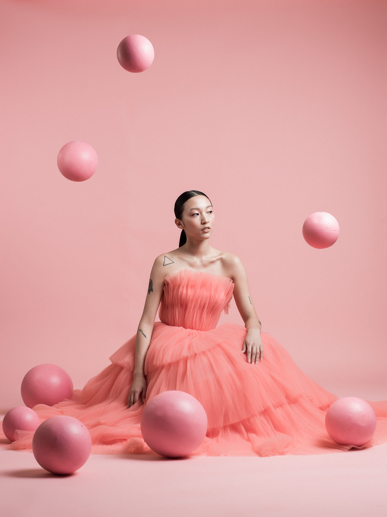 Delight Moment Bridal fashion editorial with woman in pink dress
