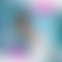 Natalie Nunn floating in the ocean holding a pink bottle for her Queen Baddie EP cover