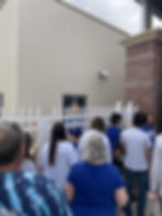 Nathaniel Lowe, starting first baseman for the Texas Rangers signs autographs for fans at 2024 Spring Training