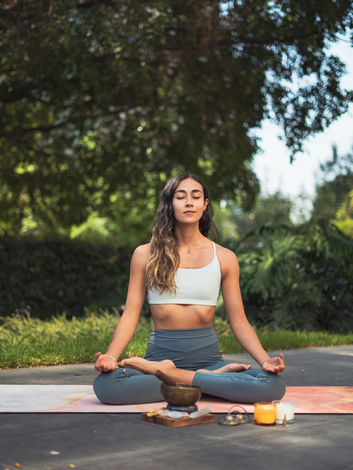 Woman meditating, Canggu, Bali
