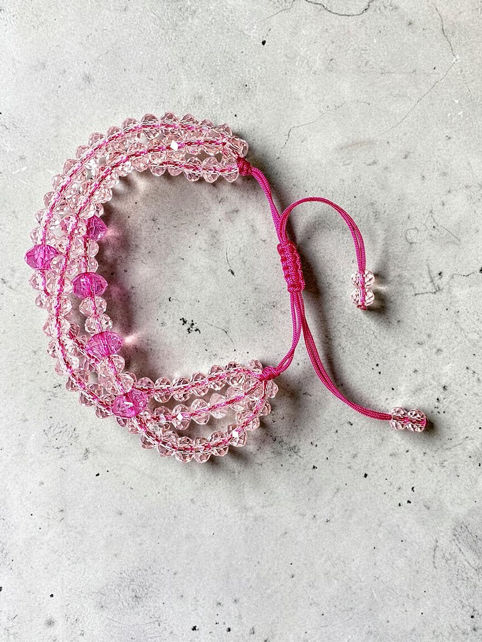 Pink crystal woven adjustable bracelet