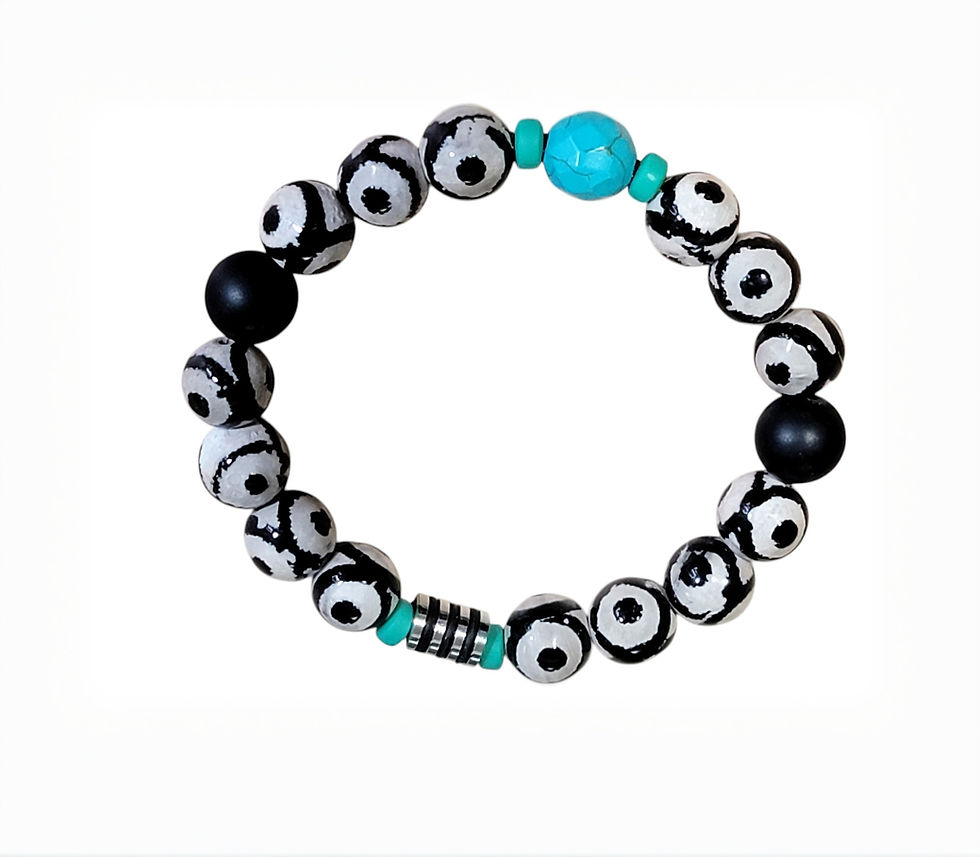 Thumbnail: Black and white patterned beaded bracelet with turquoise bead.