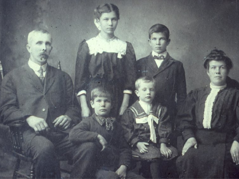Historic photograph of the Ross Family. In front (L-R) are Albert Charles Ross, George Ernest, Victor Lyle and Emmeline (nee Neeley). Mary Jane (the oldest daughter) and James Wilfred (or William) are standing in the back. As their youngest son, Alvin, is not pictured and was born 11 years after Victor, so we estimate the image was taken between 1905 and 1910. They were the second Ross family to settle in the Ahmic Harbour area. 
A history of the family with photos was published in 'Ahmic Harbour, the Story of Croswell's Landing' by the Whitestone Historical Society. 
