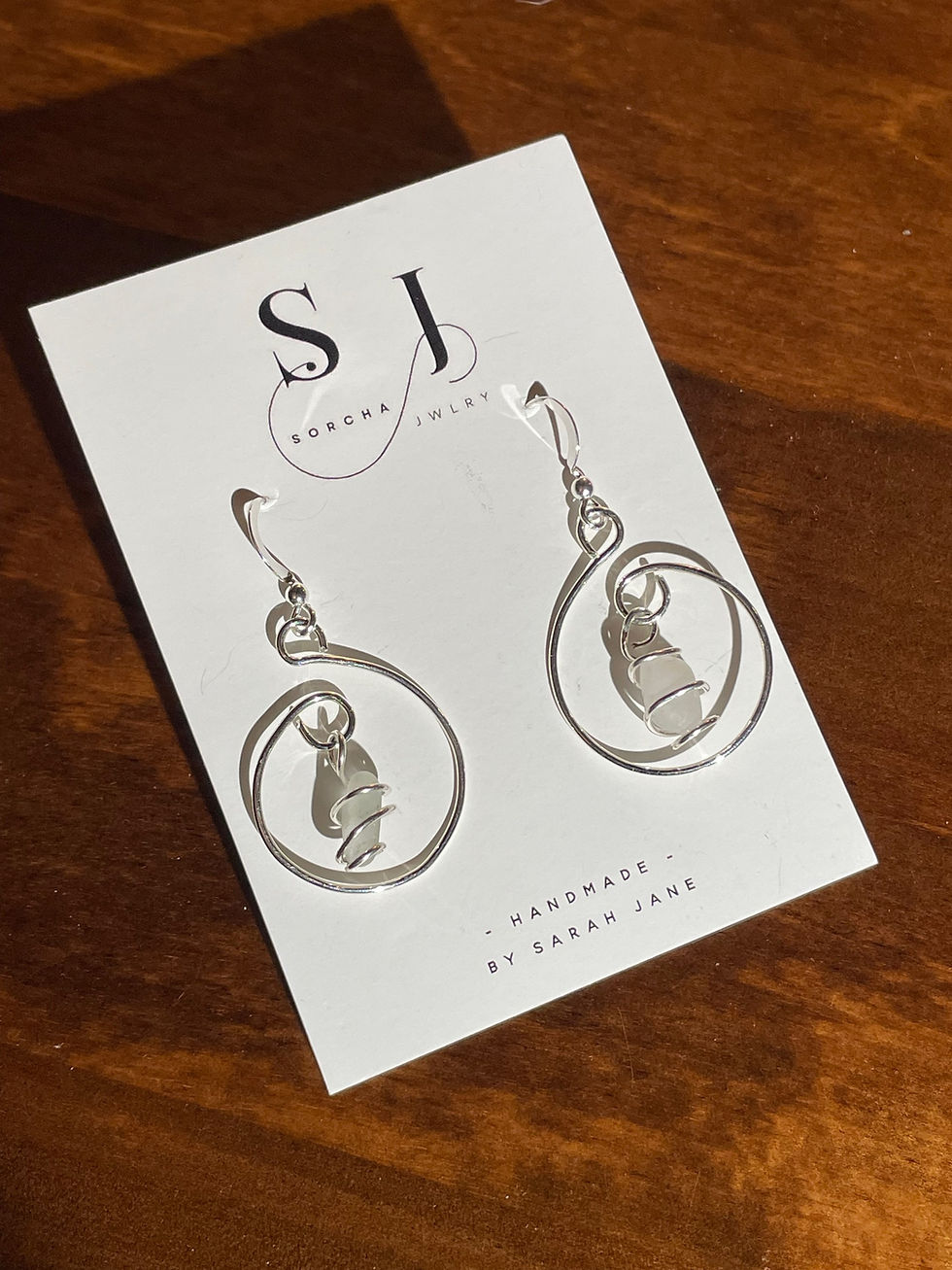 Thumbnail: Silver Spiral Drop Earring with Clear Quartz Drop