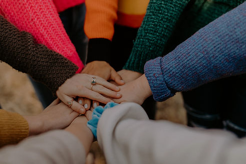 girl friends hands piled togethger_edited.jpg
