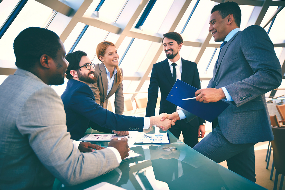 Five young professionals conducting a business meeting