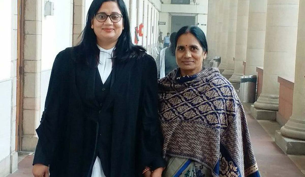 Asha Devi’s lawyer Seema Kushwaha with Asha Devi, the day after the rapists were hung.