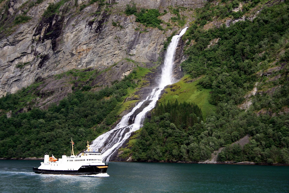 A ship passing through Geirangerfjord