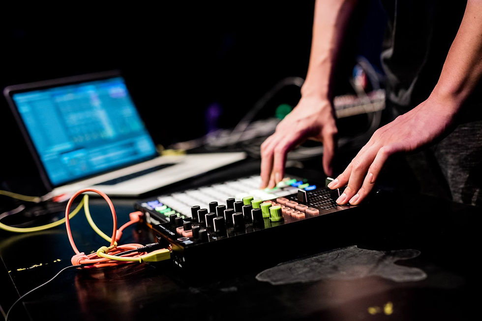 Electronic Musician on a knob controller and a pad controller