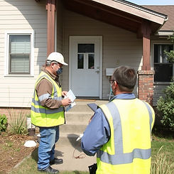 inspector making contact on a home that is vacant or foreclosed..jpg