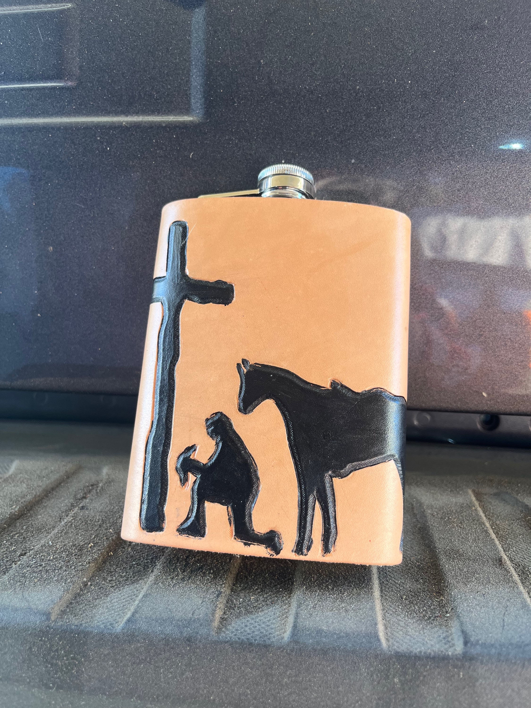 Leather covered flask (Cowboy) 