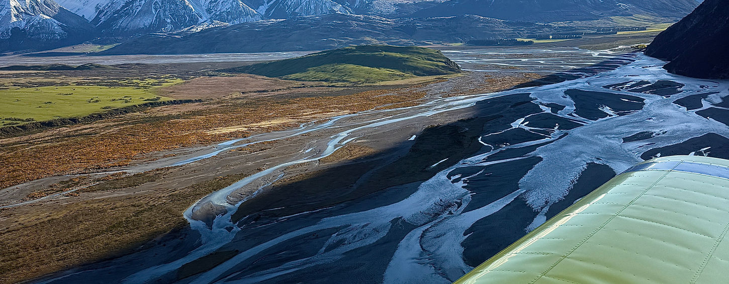 Aerial view of Canterbury irrigation channel and farmland from above