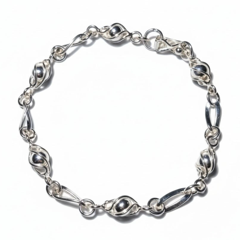 PULSERA DE PLATA BOLITAS ENCAJONADAS CON DISEÑO